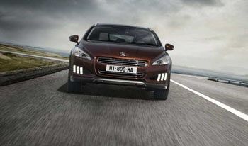 Полноприводной гибридный Peugeot 508 RXH официально представлен